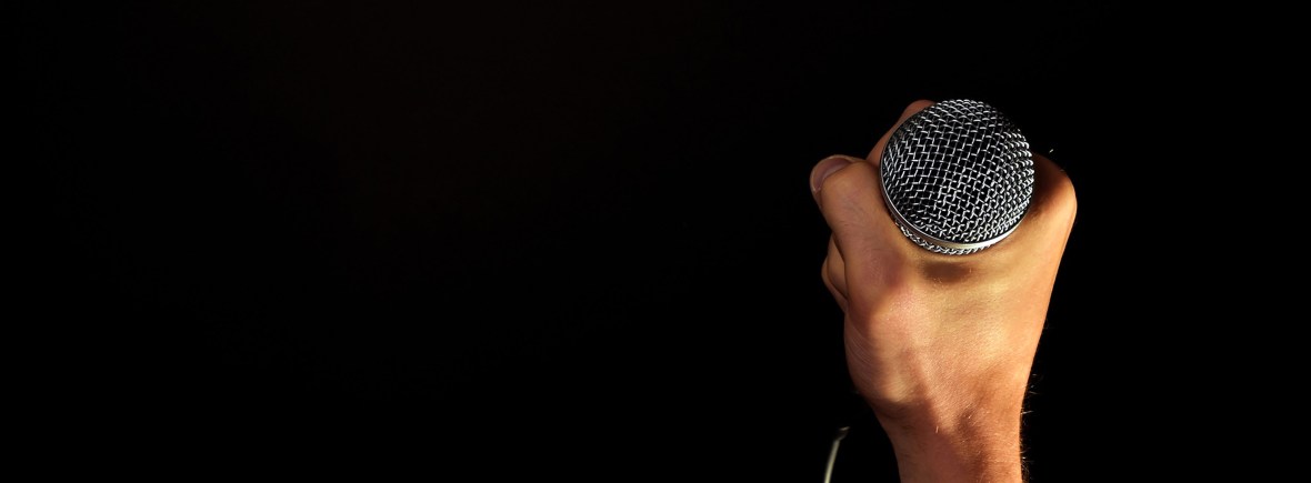 hand holding microphone